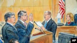 FILE - This courtroom sketch depicts former Donald Trump campaign chairman Paul Manafort (C) and his defense lawyer Richard Westling (L) before U.S. District Judge Amy Berman Jackson,at federal court in Washington, Sept. 14, 2018.