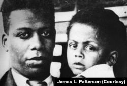 С отцом Ллойдом Паттерсоном.