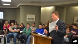 North Dakota state Sen. Oley Larsen refuses to step down from a leadership position after posting on Facebook a long-debunked photo that claims to be Minnesota Democratic Rep. Ilhan Omar holding a weapon at an al-Qaida training camp.