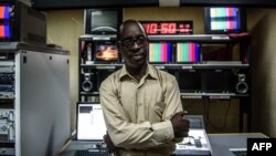 The television director of Burundi’s National Radio and Television, Nestor Bankumukunzi, poses in studio, in Bujumbura, May 15, 2015. 