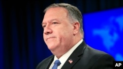 Secretary of State Mike Pompeo pauses while speaking during a news conference at the State Department in Washington, Wednesday, Aug. 5, 2020.(AP Photo/Pablo Martinez Monsivais, Pool)