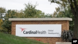FILE - A sign is displayed at the Cardinal Health, Inc. corporate office in Dublin, Ohio, Oct. 16, 2019. Negotiations aimed at reaching a major settlement in the nation's opioid litigation reached an impasse Friday, Oct. 18.