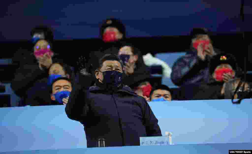 Chinese President Xi Jinping is introduced during the Opening Ceremony of the Beijing 2022 Winter Olympic Games at Beijing National Stadium. 