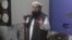 FILE - Hafiz Saeed, head of the Pakistani religious party Jamaat-ud-Dawa delivers a sermon at a mosque in Lahore, Pakistan, Nov. 24, 2017. Saeed has announced his group will field candidates in national and provincial elections in 2018.