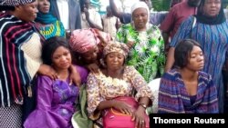 Parents of abducted students from Bethel Baptist High School wait as some are released, in Kaduna, July 25, 2021.