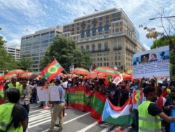 FILE - Members of the Oromo Ethiopian community in the U.S. demonstrate in support of Ethiopia's Oromo minority, in Washington, July 17, 2020.