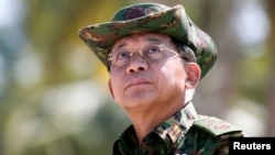 FILE - Myanmar's military commander in chief, Senior General Min Aung Hlaing, attends a military exercise at Ayeyarwady delta region in Myanmar, Feb. 3, 2018.