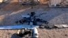 Foto ilustrasi yang menunjukkan serpihan drone di dekat pangkalan udara Ain al-Asad di anbar, Irak, pada 4 Januari 2022. (Foto: International Coalition via AP)