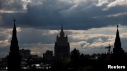 FILE - A general view shows the Russian Foreign Ministry headquarters and towers of the Kremlin in Moscow, Apr. 26, 2021.
