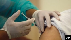 衛生專家呼籲公平分配全球疫苗
