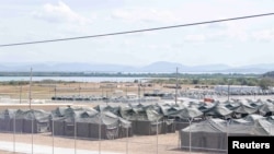 Лагерь для размещения задержанных мигрантов на базе ВМС США в Гуантанамо, Куба, 21 февраля 2025 года