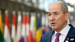 FILE - Slovenia's Prime Minister Janez Jansa arrives for an EU summit in Brussels, Belgium, Oct. 16, 2020.