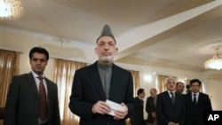 Afghan President Hamid Karzai, during a press conference in Kabul, Afghanistan on 23 Nov 2010. Afghanistan's president is denying he met with a senior Taliban leader.
