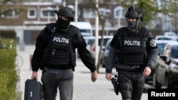 Polisi memeriksa lokasi pasca penembakan di Utrecht, Belanda, 18 Maret 2019.