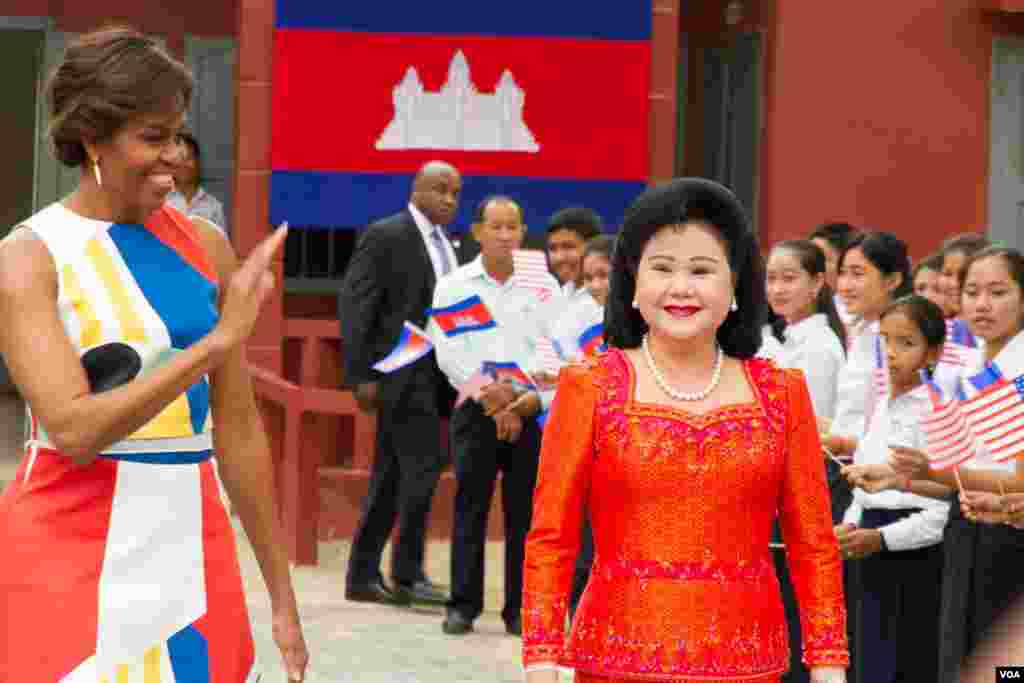 Michelle Obama arrived with her Cambodian counterpart, Bun Rany, at Hun Sen Prasat Bakong Hight School, outside Siem Reap, March 21, 2015..