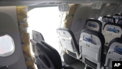 Avion kompanije Aljaska erlajns kojem je tokom leta otpao dio trupa (Foto: NTSB via AP)