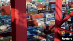 Containers are seen at the Yangshan Deep Water Port, part of the Shanghai Free Trade Zone, in Shanghai, China, Sept. 24, 2016. Beijing and Norway will resume talks on a free-trade deal, China said Tuesday. 