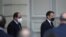 French President Emmanuel Macron, right, and Egyptian President Abdel-Fattah el-Sissi arrive for a joint news conference at the Elysee palace, in Paris, France, Dec. 7, 2020.