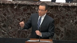 In this image from video, White House deputy counsel Mike Purpura speaks during the impeachment trial of President Donald Trump in the Senate at the Capitol in Washington, Jan. 25, 2020. (U.S. Senate TV/Handout via AP)